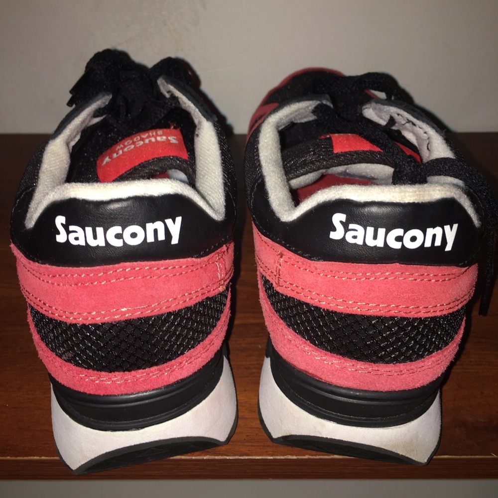 Red and white mens Saucony sneakers